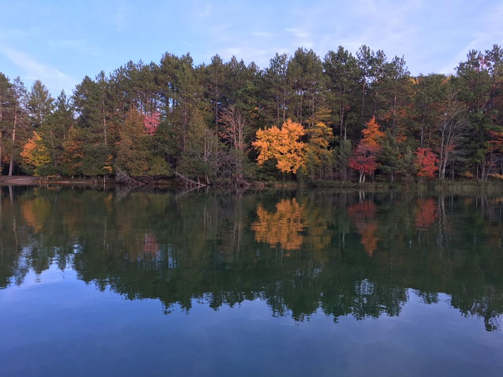 Fall colors reflected in Michigan lake
