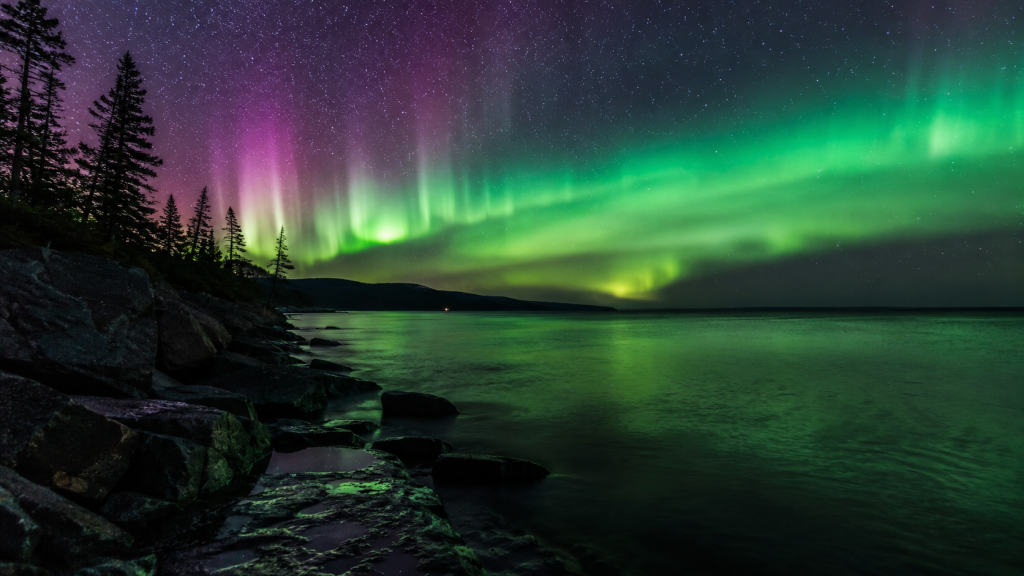 Aurora Borealis Over a Rocky Lake Superior Shoreline